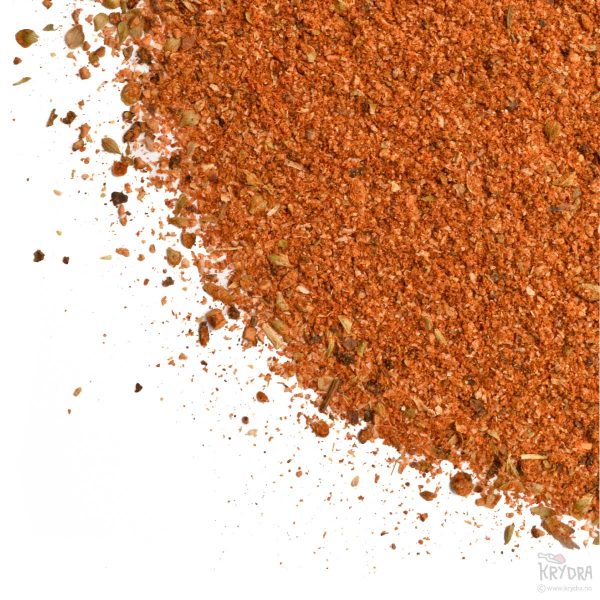 Finmalt fajitas-krydder spredt utover, rik på varme smaker av chili, paprika og spisskummen.