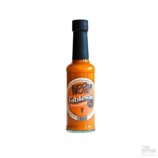 Flaske med Kyrre Krutt Tablesås – allsidig chilisaus med tomat, eple, honning og habanero.